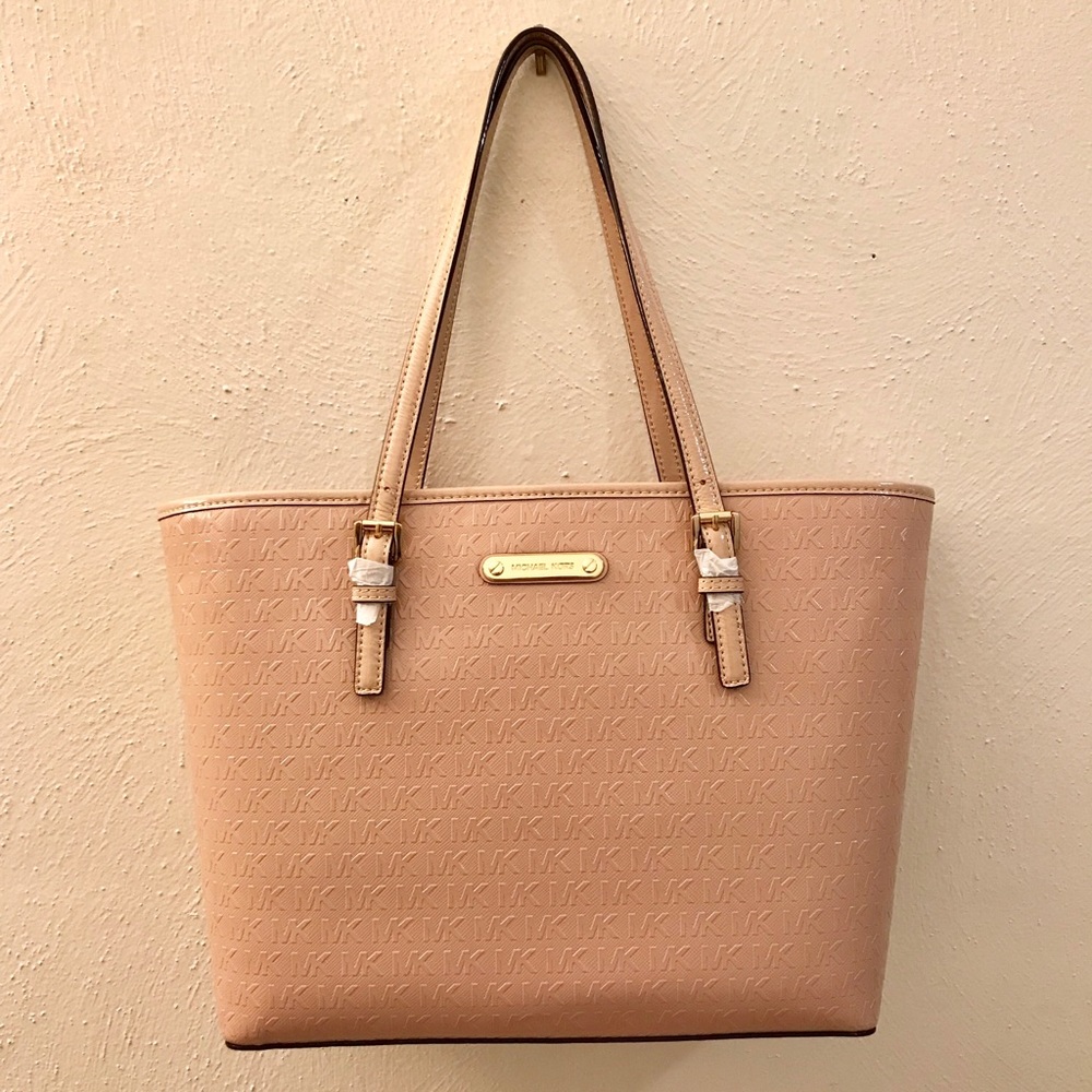 [SOLD] Authentic MK Jet Set Travel Carryall Tote